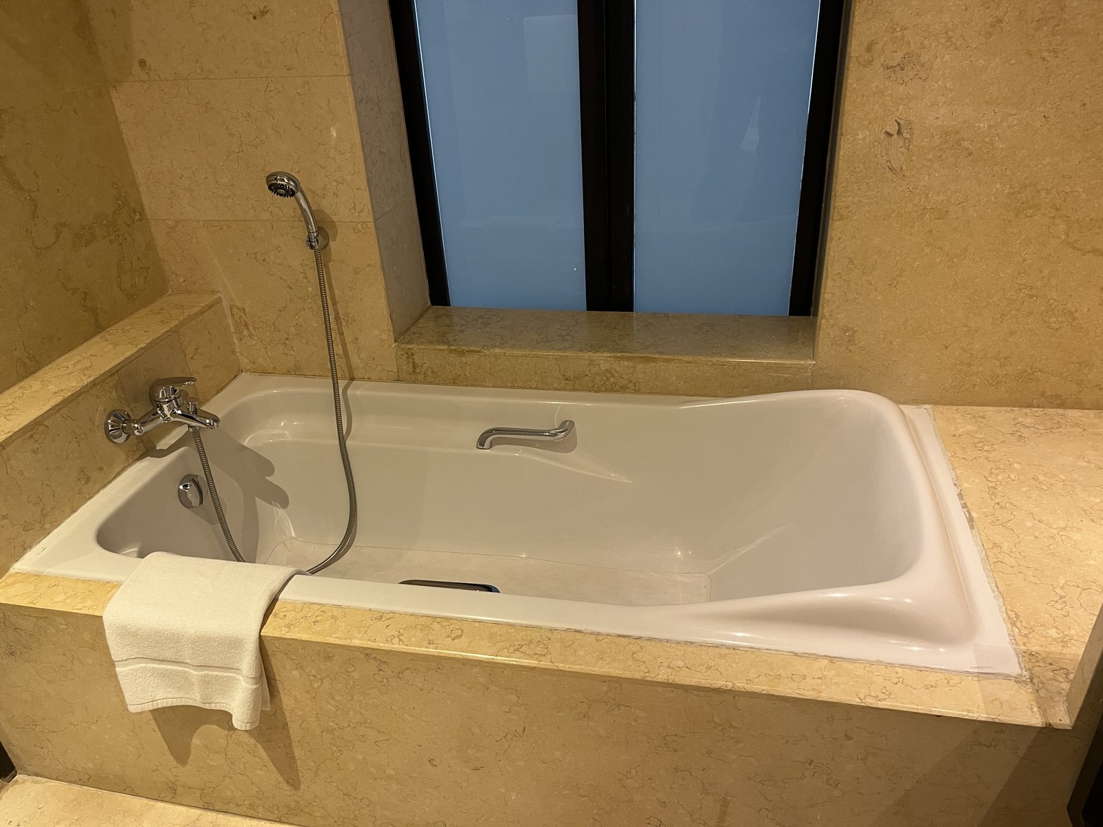 The resort's marble bathroom and bathtub